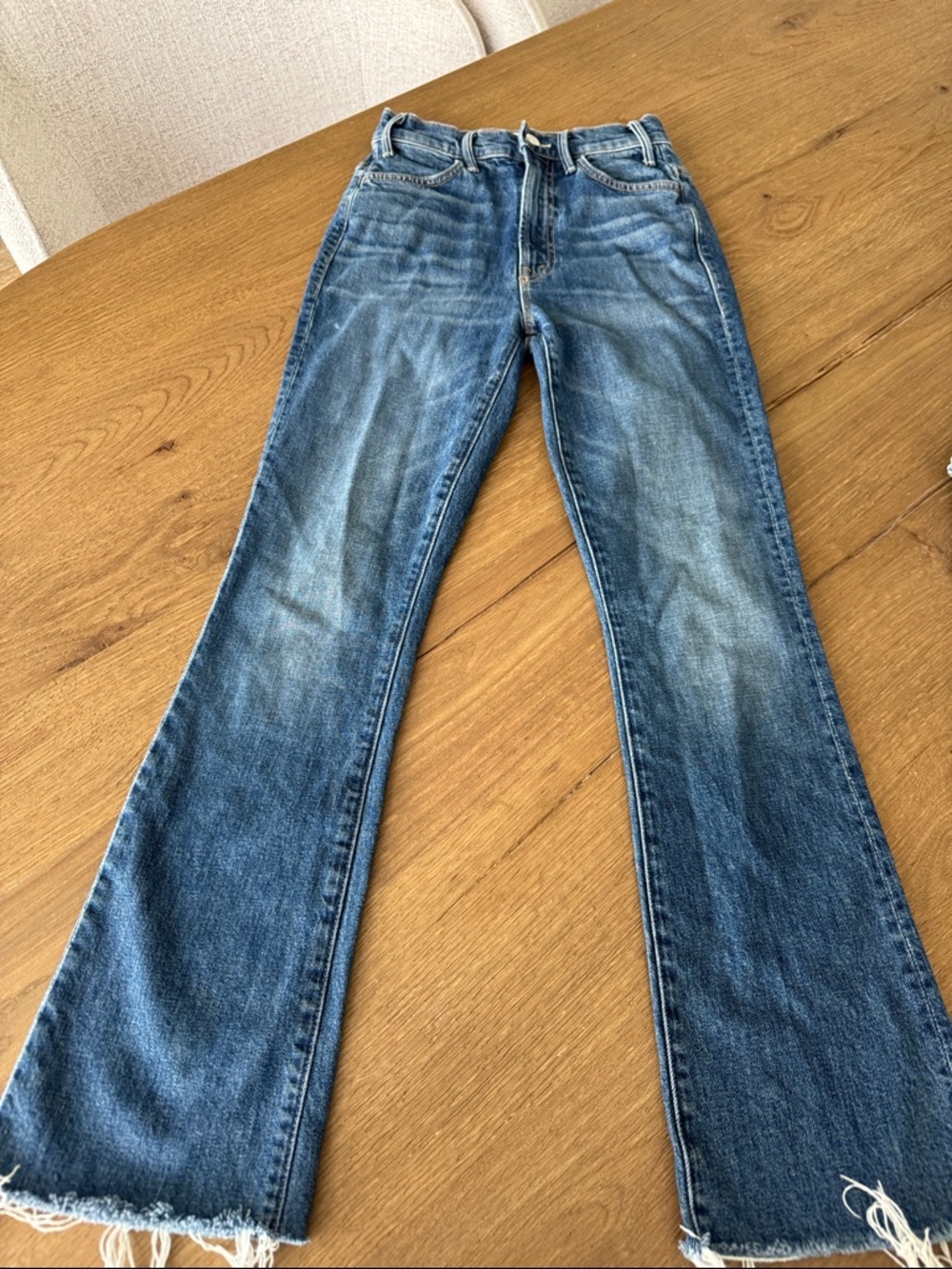 MOTHER Medium Blue Flare Jeans with Raw Hem